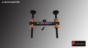 Black and copper bike chain tool with logo and a small metal pin.