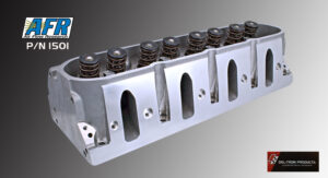 Close-up of a metal engine cylinder head with valve springs.