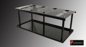 Black metal and glass table with multiple holes on top surface.