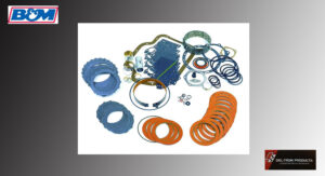 Various colorful rubber and plastic gaskets and seals arranged on a white background.