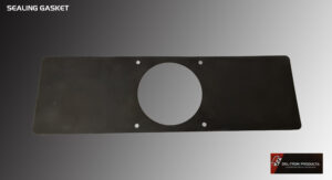 Flat black metal plate with a large central circular hole and four smaller surrounding holes.