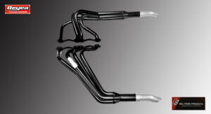 Polished chrome motorcycle exhaust headers on a reflective surface.