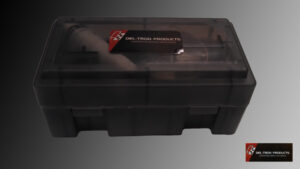 Black plastic toolbox with a closed lid and a red label.