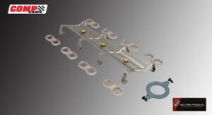 A mechanical assembly with rods, springs, and metal components on a gray surface.