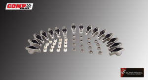 A variety of spoons and measuring cups neatly arranged in a semicircle.