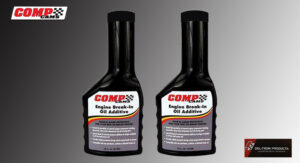 Two bottles of COMP Cams Engine Break-In Oil Additive.