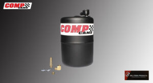 Black COMP Cams oil catch can with fittings on a gray background.