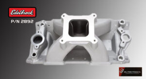 Silver aluminum intake manifold for an engine with a square opening.