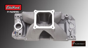 Close-up of a metallic engine intake manifold component.