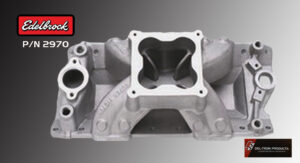 Silver automotive intake manifold with a large square opening on top.