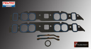 Car engine gasket set with various seals and metal components.