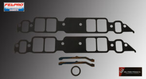 Engine gasket set with various seals and components.