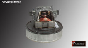 A vintage mechanical device with a transparent casing revealing internal components.