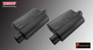 Two black cylindrical mufflers with embossed branding on a gray background.
