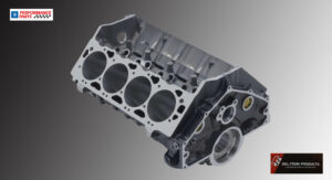 Close-up of a V8 engine block showcasing cylinder bores and mounting points.