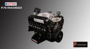 High-performance V8 engine displayed on a stand with detailed components.