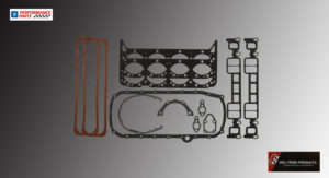 Various engine gaskets laid out on a flat surface.