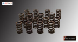 A collection of rusty metal coil springs arranged on a surface.