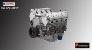 A clean, detailed V8 engine against a gray background.