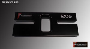 Close-up of a black metal panel with cutouts and white text.