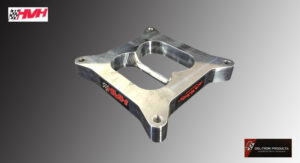 Metallic mechanical part with engraved text on a gray background.