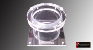 Clear plastic laboratory funnel with a wide opening and base plate.