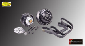 Disassembled mechanical parts with screws and components on a gray background.