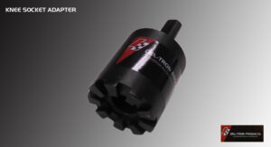 Close-up of a black metal tool with a red and white logo on a gray background.