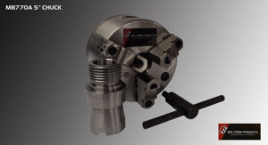 Precision metalworking tool with interchangeable components on a dark background.