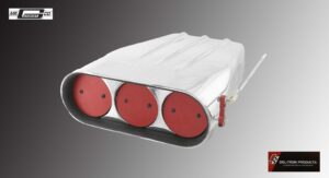 A white cloth covering three red circular objects in a row.