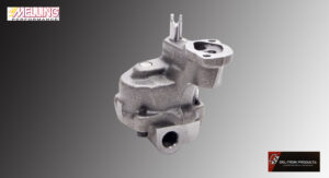 A metallic mechanical component with multiple openings and mounting points.