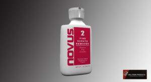 A white bottle of Novus 2 Fine Scratch Remover on a gray background.
