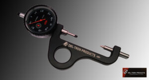 Close-up of a precision dial thickness gauge measuring tool.