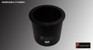 Black plastic container with a label on a gray surface.