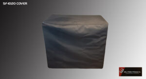 A rectangular object covered with a dark gray fabric cover.