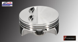 A shiny metal piston against a gray background.