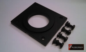Black square mounting plate with four screws on a white surface.