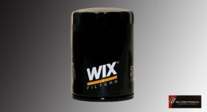 Black Wix oil filter with white and orange logo on gray background.