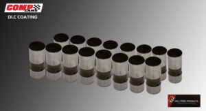 A group of plastic cups filled with a layered drink on a gray surface.