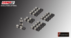 Several sets of metal roller bearings arranged neatly on a smooth surface.