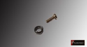 A small metal screw and a threaded ring on a gray background.