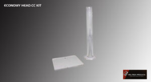 A clear plastic syringe and a small rectangular tray on a white surface.